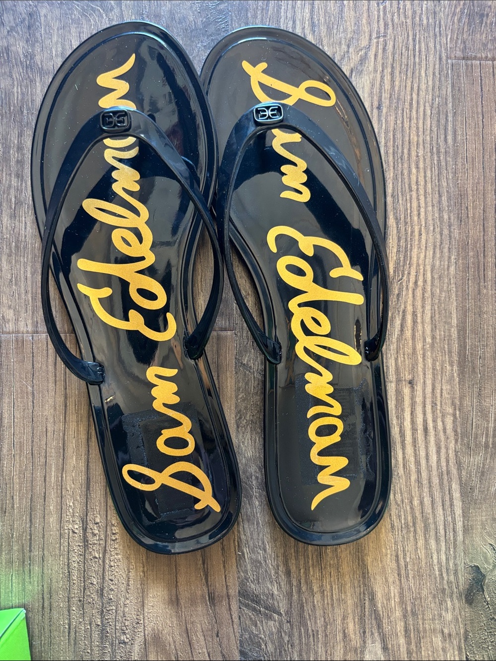 Sam Edelman Black Flip Flop Sandals with Gold Script
